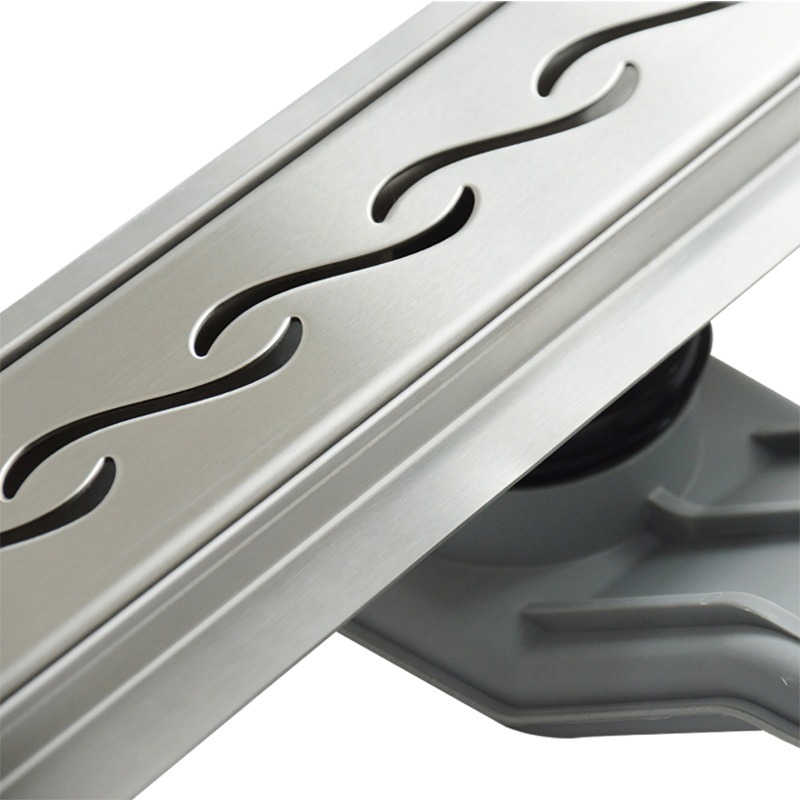Wellis W-Drain rozsdamentes acél zuhanyfolyóka Wavy ráccsal
